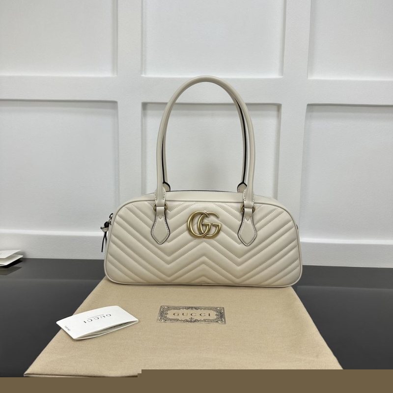 G*u*i top handle bags